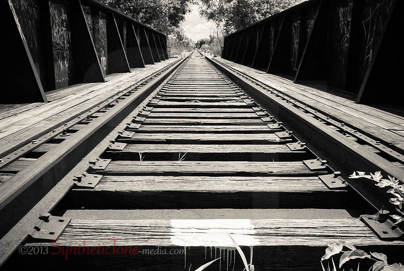 Railroad Tracks On Bridge